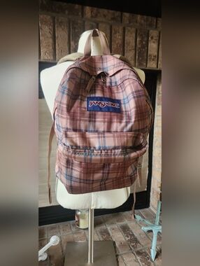 JanSport plaid backpack.